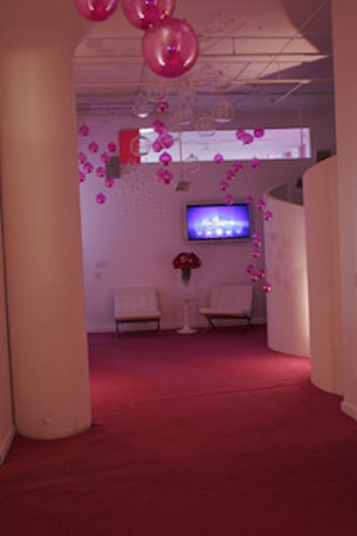 Even the entrance was girly, with pink carpeting and chandeliers strung with glass spheres.