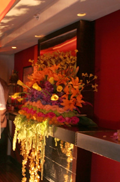 Craig Goldstein of the Zanadu Group designed cascading floral arrangements that were placed throughout the bar area.
