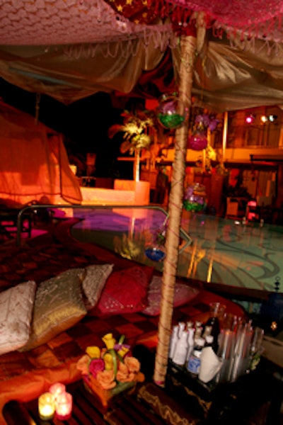 Around the pool, deck chairs were pushed together to create large lounge areas for guests.