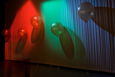 Gold balloons floating three feet in the air added some whimsy to the decor.