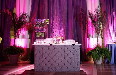 Purple drapes covered the walls, and tufted lavender-hued velvet bars amped up the party's luxury quota.