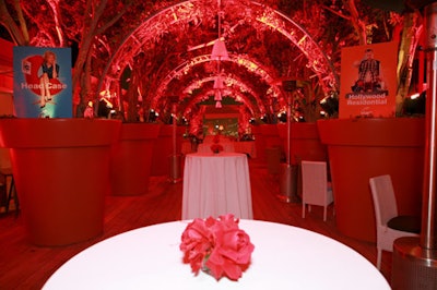 A red-lit tree canopy covered the space.