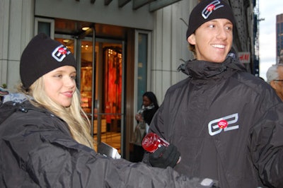 Staffers endured the chilly weather, handing out G2 samples throughout the day.