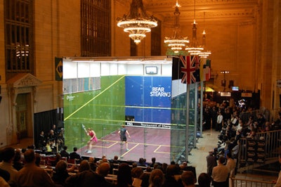 Inside the glass-walled court, U.S. player Natalie Grainger defeated Vanessa Atkinson of the Netherlands in the women's semifinal; Grainger went on to win the women's challenge.