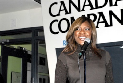 Jully Black performed two high-energy sets on a small stage at the front of the room.