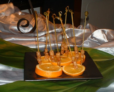 Keeping it simple, the catering team also served honey-glazed scallops on a fresh orange-slice garnish.
