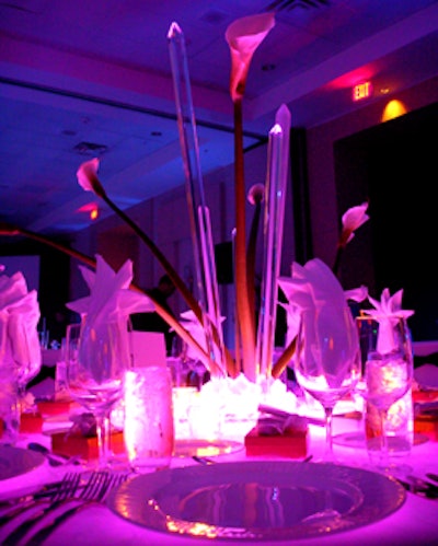 Centerpieces of elegant calla lillies and crystal ice spears sat atop each of the tables.