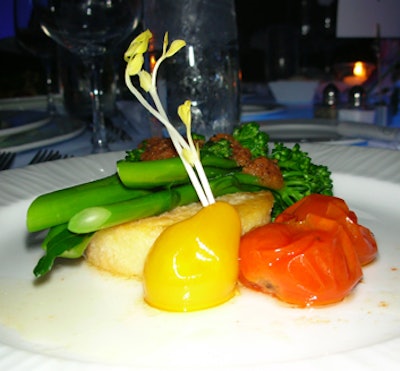 Guests began their feast with confit tomatoes, broccolini, and Bermuda onions served over polenta tostada with a serrano pepper sauce and avocado crème.