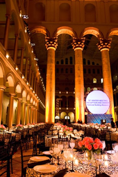 Columns glowed in gold behind the stage.