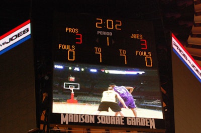 The JumboTron displayed the competition on the court.