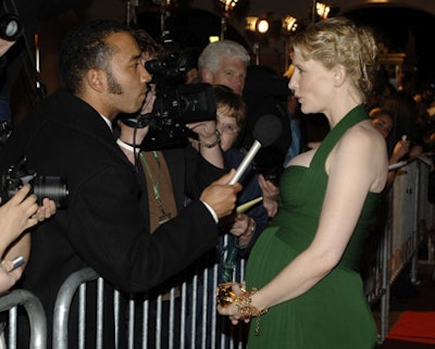 Cate Blanchett spoke to reporters outside during the festival's rainy opening weekend.