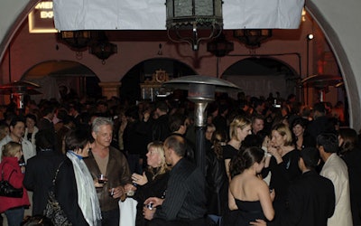 A crowd gathered in a smaller space than was originally planned for the party following the first night's Definitely, Maybe screening—an improvisation on account of the storm.