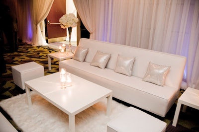 The private lounge featured white carpets, couches, and sequined cushions.