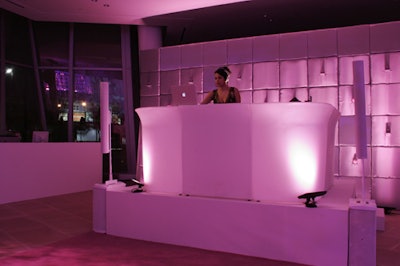 DJ Rashida played a mix of contemporary and old-school music from her podium in front of a padded wall lined with pink globes (to represent pearls) and the new phone.