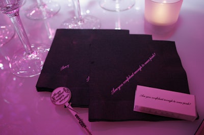 Even small items such as the napkins, cocktail stirrers, and boxes of mints tied into the event's black-and-pink palette and its tagline, 'Are you confident enough to wear pink?'