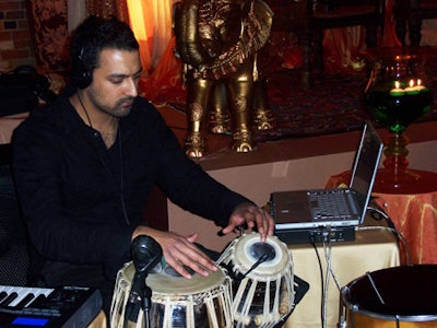 Tej Hunjan, a local drummer, DJ, and producer, provided entertainment throughout the evening.