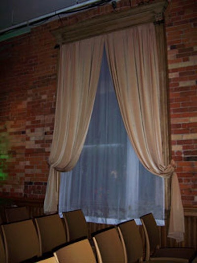 Golden curtains with white sheers replaced the usual black drapery in the Gladstone Hotel's north ballroom.