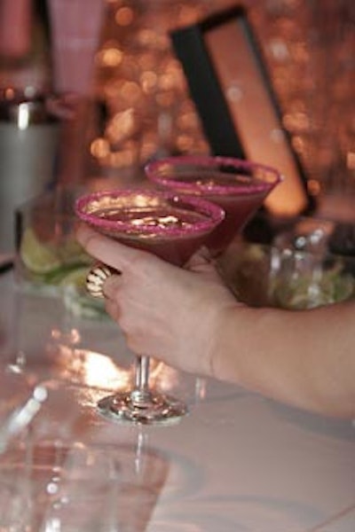 Bartenders poured cocktails in the night's signature color.