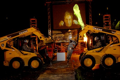 Conductor Michael Tilson Thomas directed construction equipment in sync with music and a pyrotechnic finale for the groundbreaking ceremony.