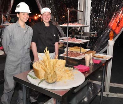 Staffers outfitted in one-piece suits and hard hats manned food stations, courtesy of Lyon & Lyon Catering.