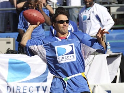 Blue-team quarterback Doug Flutie earned his team a win.