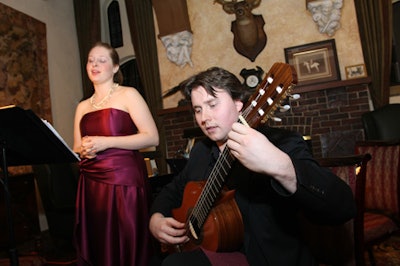 Two students performed in the coat-check area of Casa Loma.