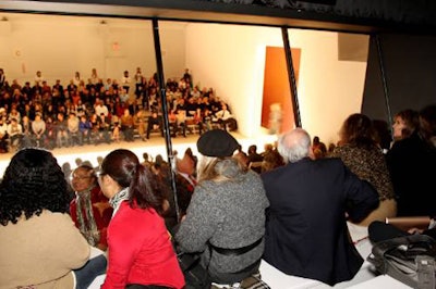 Above the crowds, the skybox provides private viewing for AmEx cardholders.