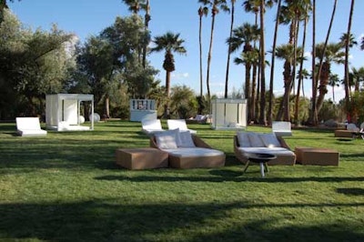 An outdoor lounge area with oversize couches and beds from Taylor Creative was reformatted for each event.