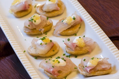 Celebrity chef Jamie Kennedy prepared cold smoked Georgian Bay whitefish on red fife blinis at a food station during the reception.