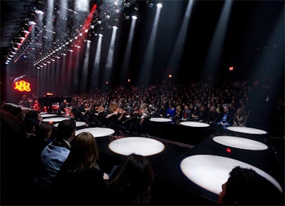 The intense white showgun lights created a polka-dot effect on the surface of the runway and emphasized shadows.