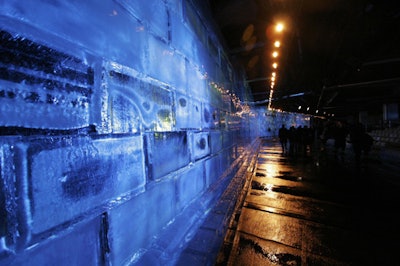 Before the presentation, the wall was washed in an icy blue light.