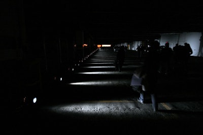 Green lights lit the way through the pier's parking garage.