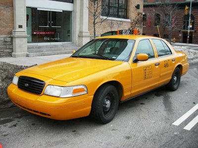 A New York City taxi parked outside the event venue.