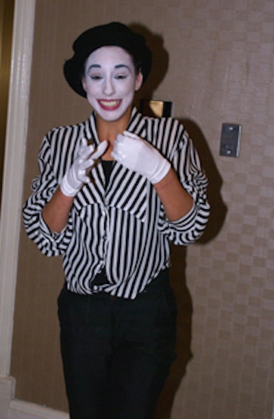 Friendly yet mischievous mimes gave arriving patrons a laugh.