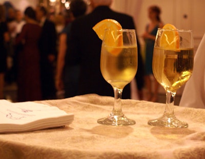 At the cocktail reception, guests were sipped citrus Chambord cocktails.