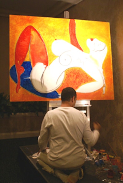 A French artist worked on a Matisse-inspired painting during the cocktail hour.