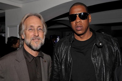 Recording Academy president and C.E.O. Neil Portnow posed with rapper-designer Jay-Z, whose collection was featured in the show.