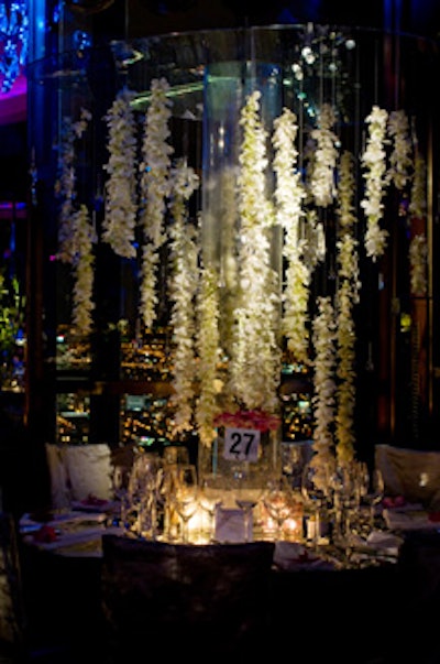 Fête's towering waterfall structure included suspended crystal prisms and teardrops, along with a mirrored tabletop.