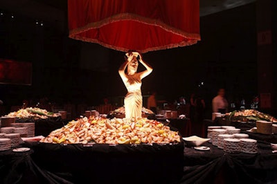 A seafood bar offered mountians of shrimp.