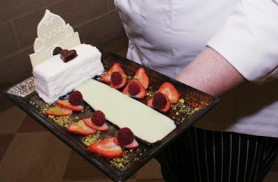 The individual coconut and white-chocolate cakes featured a pistachio crème anglaise 'reflecting pool.'