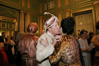 Well-dressed guests mingled for cocktails in the green room.