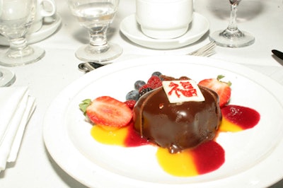 Dufflet Pastries supplied chocolate hazelnut cakes with berries and coulis for dessert.