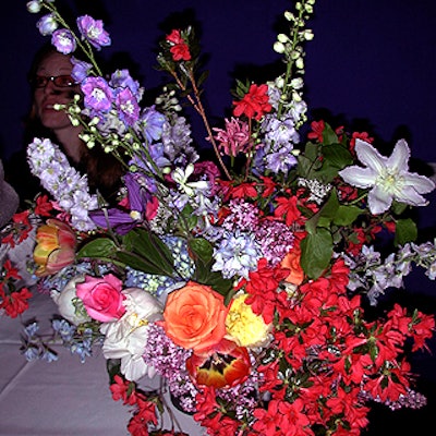 A floral display by Zeze Flowers at the check-in table.