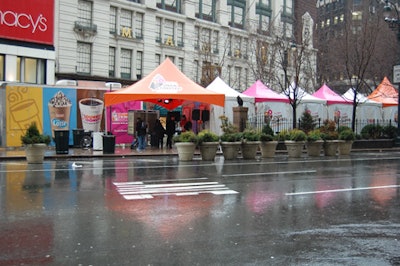 A series of white-, pink-, and orange-colored tents provided shelter (and warmth) in Herald Square for Dunkin' Donuts's Valentine's Day stunt.