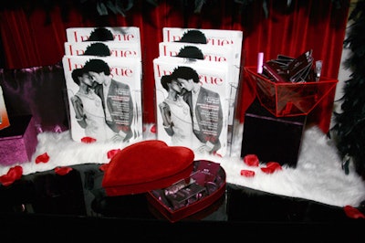 Surrounded by red velour, feathery accents, and red rose petals, the inside of the bus doubled as a display for the various products from K-Y.