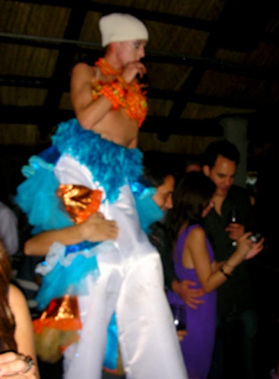 A stiltwalker danced and interacted with guests throughout the night.