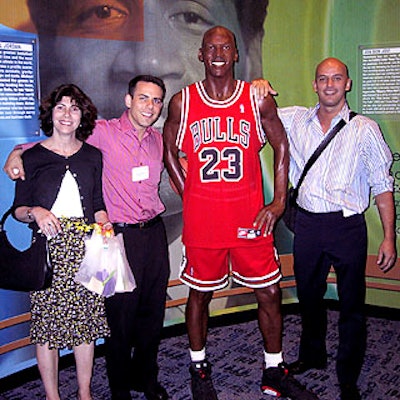 Musters & Company's Julie Seitzman, John Ierardi and Mark Musters posed with the wax Michael Jordan.