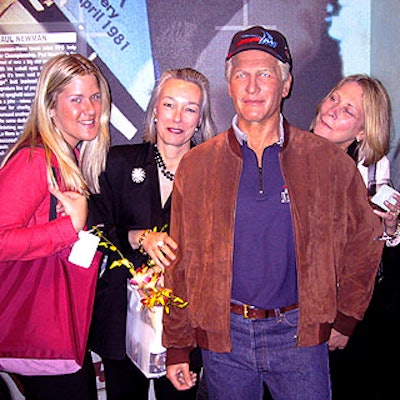 Match Catering & Eventstyles' Michele Pokowicz, Cathy Morrell and Joan Steinberg posed with the wax Paul Newman.