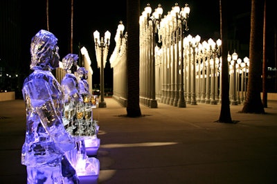 Ice sculptures in the shape of waiters served up champagne.