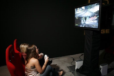 Propped against the wall in the main party space was an Xbox station for a Dodge racing game, with room for four players. The console added a less female-oriented activity to the event.